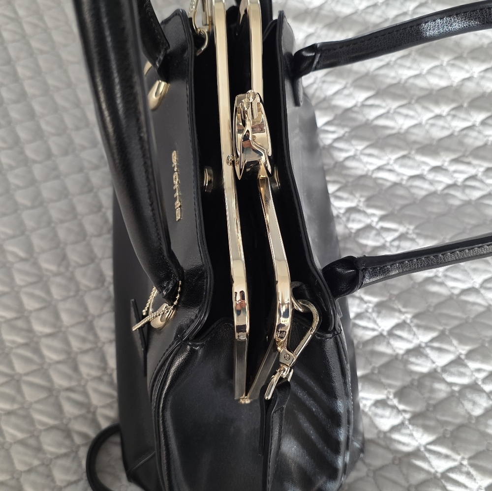 Elegant Black Handbag with Gold Accents